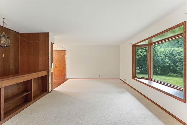 18612 Springcrest Dr, Minnetonka, MN 55345 - spare room featuring carpet flooring and baseboards