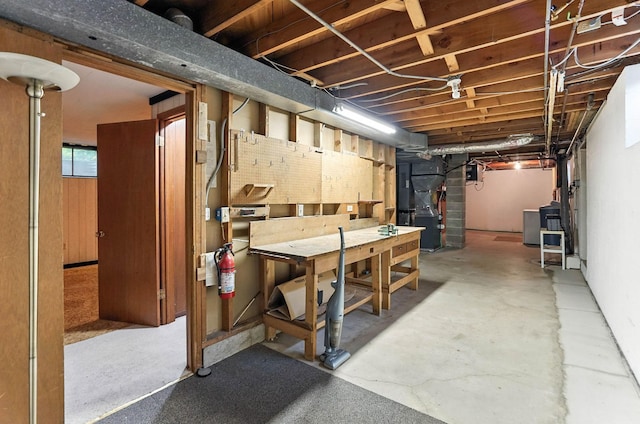 18612 Springcrest Dr, Minnetonka, MN 55345 - basement featuring a workshop area and heating unit