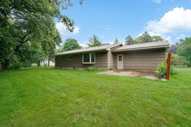 18612 Springcrest Dr, Minnetonka, MN 55345 - back of property featuring a yard and a patio area