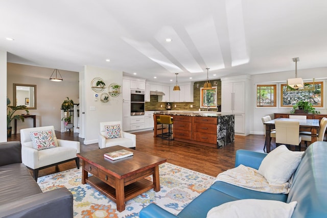 4011 Grimes Ave S, Edina, MN 55416 - living room with dark wood-style flooring and recessed lighting