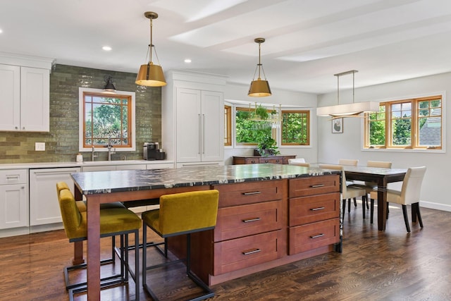 4011 Grimes Ave S, Edina, MN 55416 - kitchen featuring dishwasher, white cabinetry, hanging light fixtures, recessed lighting, and dark wood-type flooring