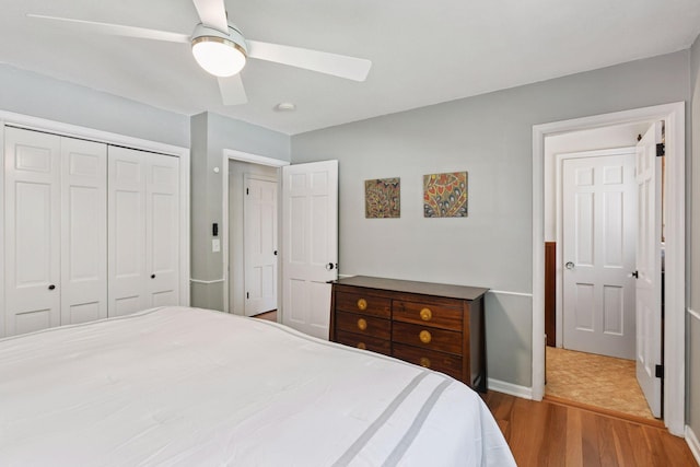 4011 Grimes Ave S, Edina, MN 55416 - bedroom with wood finished floors, a closet, and a ceiling fan