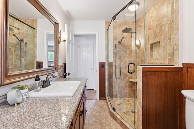 4011 Grimes Ave S, Edina, MN 55416 - bathroom with vanity and a stall shower