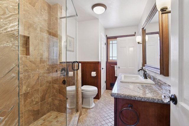 4011 Grimes Ave S, Edina, MN 55416 - full bathroom featuring a shower stall, vanity, and a wainscoted wall