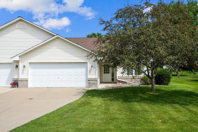 343 Tuttle Dr, Hastings, MN 55033 - view of front of house with driveway, an attached garage, and a front yard
