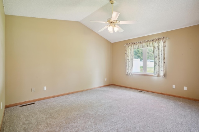 343 Tuttle Dr, Hastings, MN 55033 - carpeted spare room featuring a ceiling fan and vaulted ceiling