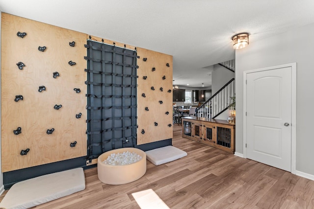 1174 139th St E, Rosemount, MN 55068 - entryway featuring wood finished floors and stairs