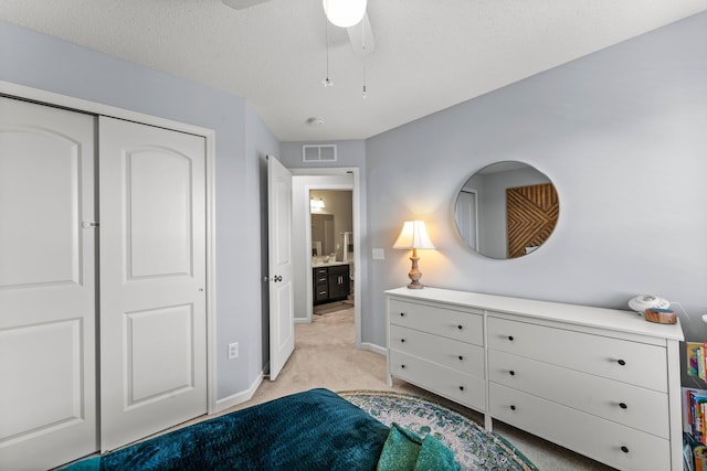 1174 139th St E, Rosemount, MN 55068 - bedroom featuring light colored carpet, ceiling fan, and a closet