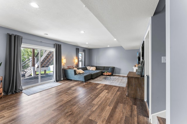1174 139th St E, Rosemount, MN 55068 - living area with dark wood-type flooring, a textured ceiling, and recessed lighting
