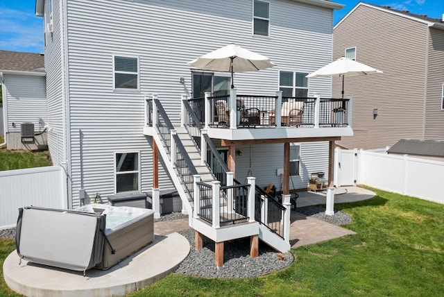 1174 139th St E, Rosemount, MN 55068 - rear view of house featuring a wooden deck, a fenced backyard, stairs, and a patio