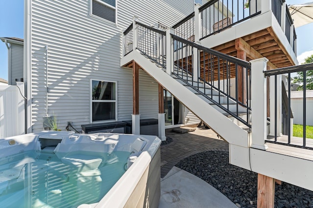 1174 139th St E, Rosemount, MN 55068 - view of patio / terrace with stairway and a hot tub