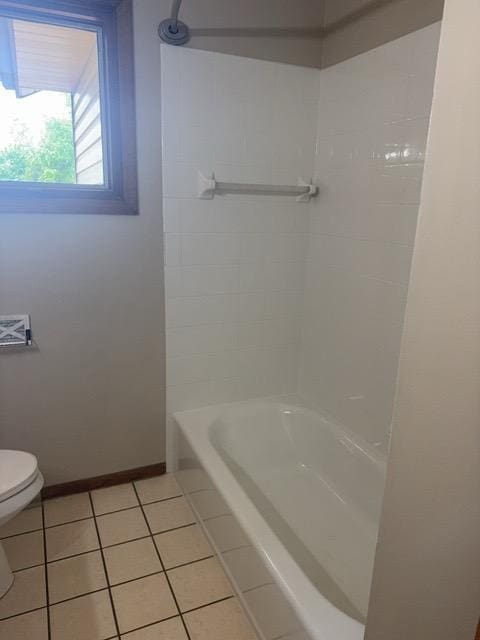 240 12th Ave, Grand Rapids, MN 55744 - full bath featuring tile patterned flooring and bathing tub / shower combination