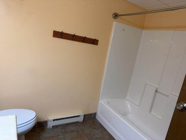 240 12th Ave, Grand Rapids, MN 55744 - full bath featuring baseboard heating and shower / tub combination