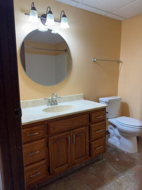 240 12th Ave, Grand Rapids, MN 55744 - bathroom with vanity, tile patterned flooring, and a drop ceiling