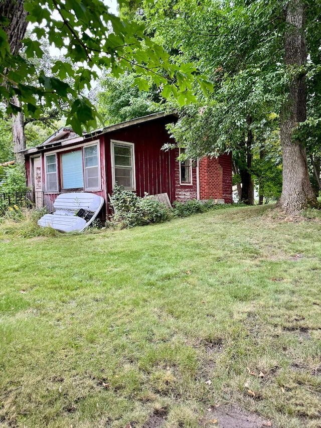 44493 Nitche Lake Rd, Pine Lake Twp, MN 56573 - view of side of property featuring a lawn