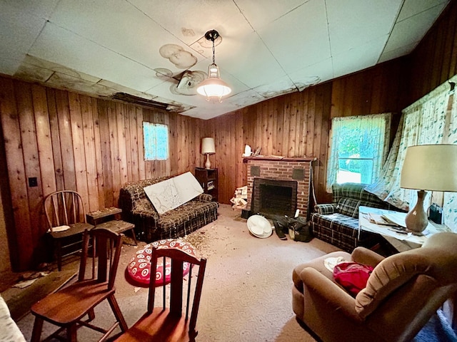 44493 Nitche Lake Rd, Pine Lake Twp, MN 56573 - living room with plenty of natural light, wood walls, carpet flooring, and a fireplace