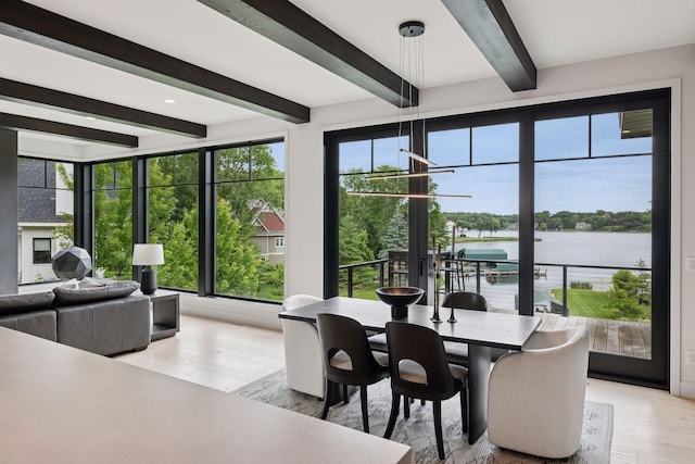 1300 Wildhurst Trl, Orono, MN 55364 - dining area featuring beamed ceiling, a water view, light wood-style floors, and french doors