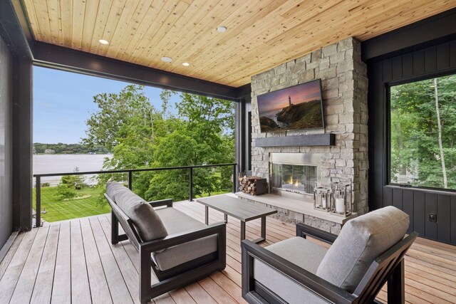 1300 Wildhurst Trl, Orono, MN 55364 - wooden deck featuring an outdoor living space with a fireplace