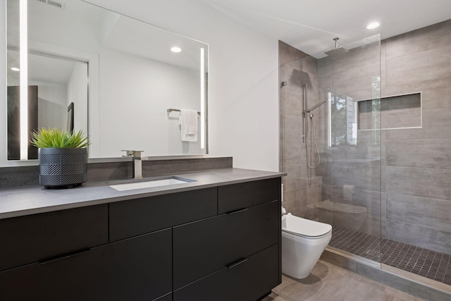 1300 Wildhurst Trl, Orono, MN 55364 - bathroom featuring vanity, a tile shower, and recessed lighting