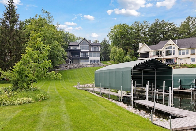 1300 Wildhurst Trl, Orono, MN 55364 - dock area with a yard, boat lift, and a water view