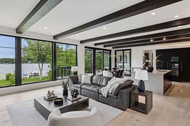 1300 Wildhurst Trl, Orono, MN 55364 - living room featuring beam ceiling, light wood finished floors, wine cooler, and recessed lighting