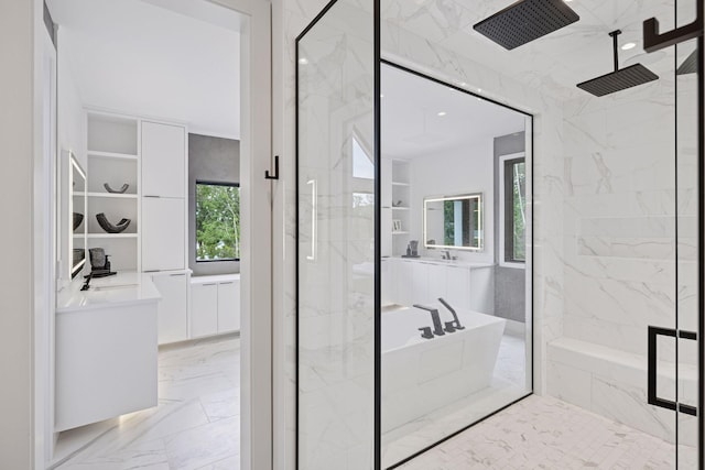 1300 Wildhurst Trl, Orono, MN 55364 - full bath with marble tiled flooring, a marble finish shower, and a bath