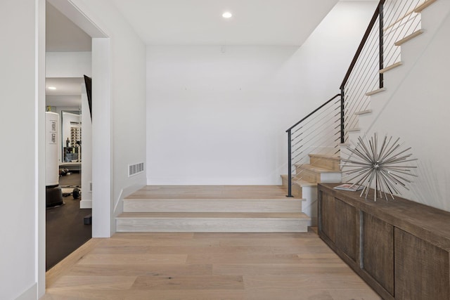 1300 Wildhurst Trl, Orono, MN 55364 - stairs featuring wood finished floors and recessed lighting