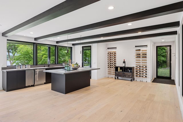 1300 Wildhurst Trl, Orono, MN 55364 - kitchen with dishwasher, beamed ceiling, a kitchen island, dark cabinets, and modern cabinets