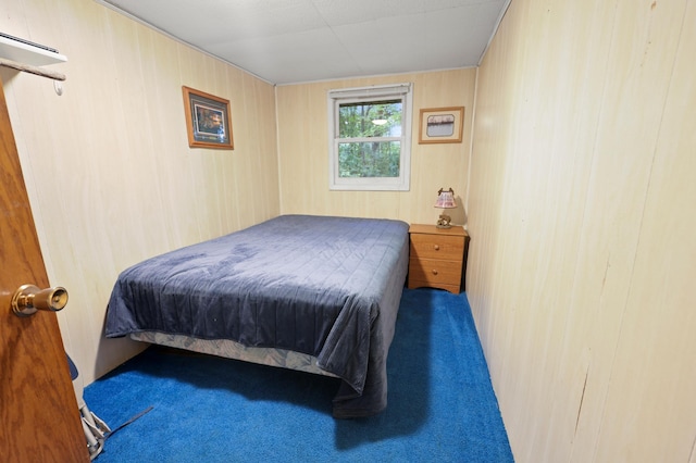 14364 Hummingbird Trl, Bay Lake Twp, MN 56444 - carpeted bedroom featuring wooden walls