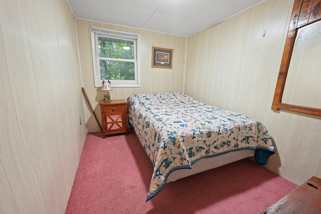 14364 Hummingbird Trl, Bay Lake Twp, MN 56444 - bedroom with carpet floors and wooden walls