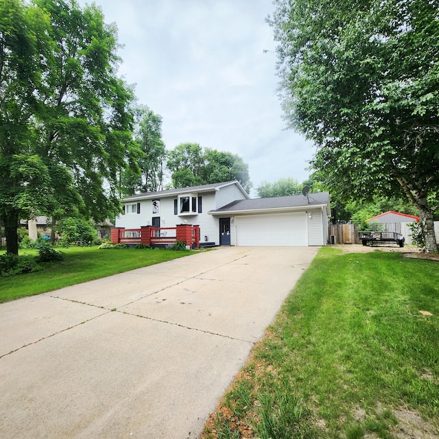 306 Parkview Curv, Zumbrota, MN 55992 - view of front of house featuring concrete driveway and an attached garage
