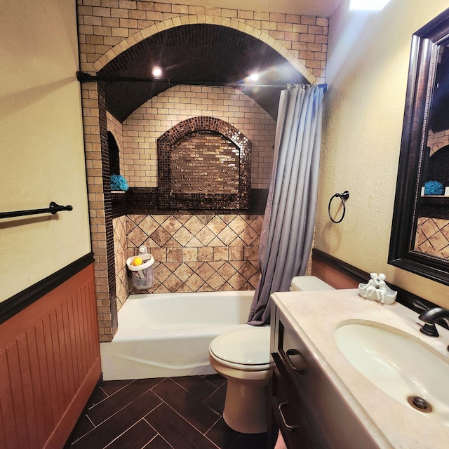 306 Parkview Curv, Zumbrota, MN 55992 - full bathroom featuring shower / tub combo, vanity, tile patterned floors, and wainscoting