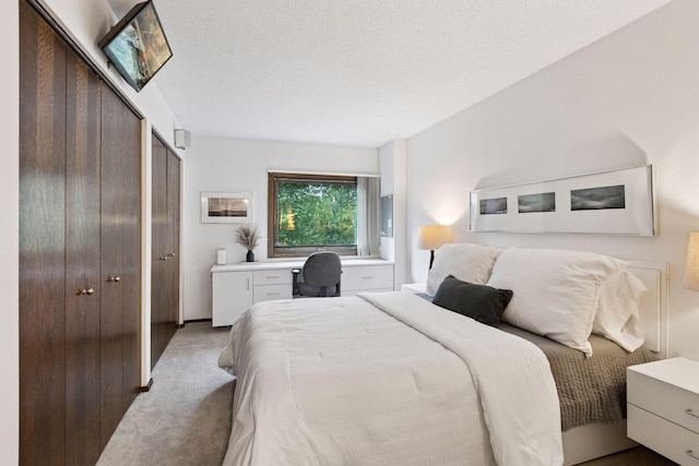 1200 Nicollet Mall Unit 409, Minneapolis, MN 55403 - bedroom featuring light colored carpet and a textured ceiling