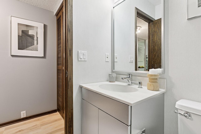 1200 Nicollet Mall Unit 409, Minneapolis, MN 55403 - half bathroom with vanity and a textured ceiling