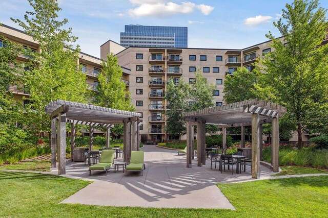 1200 Nicollet Mall Unit 409, Minneapolis, MN 55403 - view of property's community featuring a pergola, a yard, and a patio area