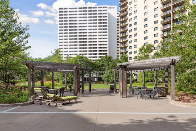 1200 Nicollet Mall Unit 409, Minneapolis, MN 55403 - view of home's community featuring a pergola, a patio, and outdoor dining space