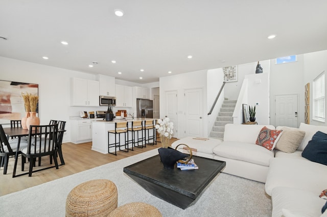 14388 Allerton Way, Rosemount, MN 55068 - living room with stairway, light wood finished floors, and recessed lighting
