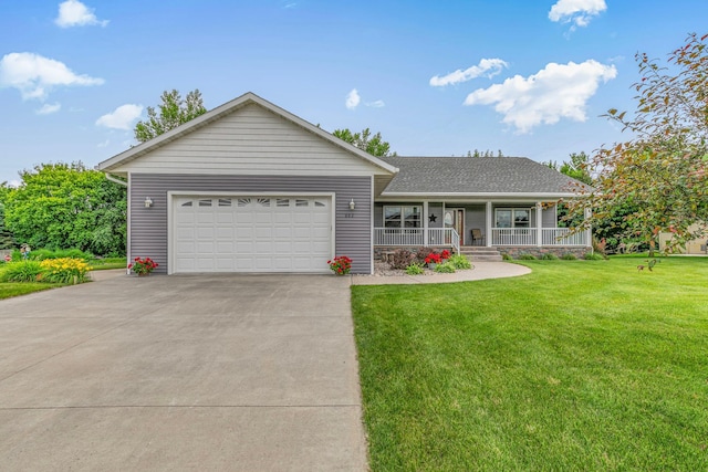 662 Cottonwood Ave, Litchfield, MN 55355 - ranch-style home with a porch, a front lawn, a garage, driveway, and a shingled roof