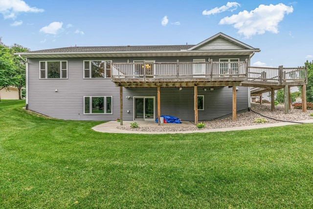 662 Cottonwood Ave, Litchfield, MN 55355 - back of house featuring a wooden deck, a lawn, a patio, and roof with shingles