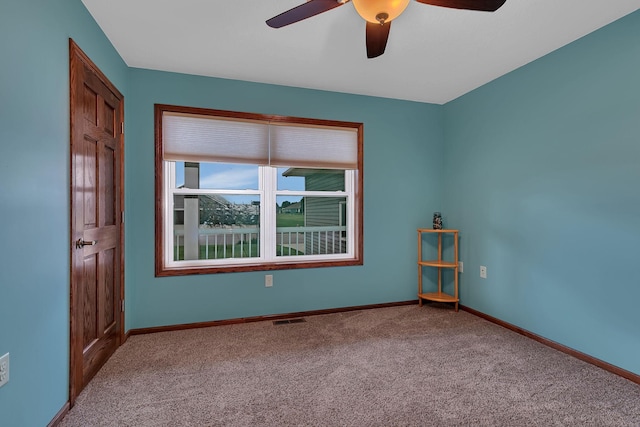 662 Cottonwood Ave, Litchfield, MN 55355 - carpeted empty room with ceiling fan and baseboards