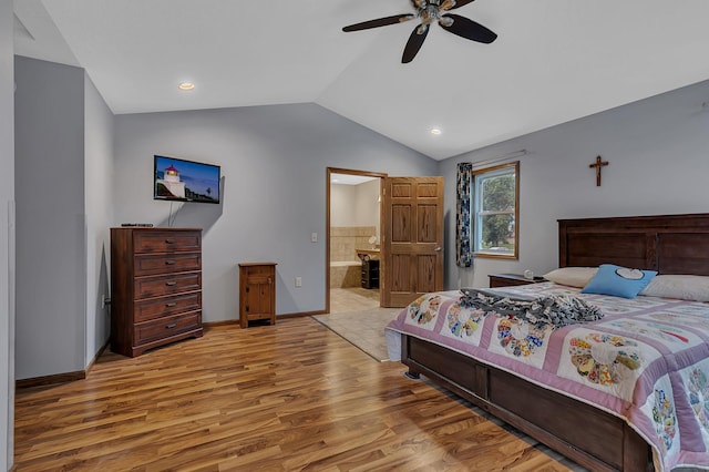 662 Cottonwood Ave, Litchfield, MN 55355 - bedroom featuring light wood-style floors, vaulted ceiling, ensuite bathroom, ceiling fan, and recessed lighting