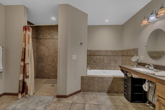 662 Cottonwood Ave, Litchfield, MN 55355 - bathroom with vanity, a garden tub, tiled shower, tile patterned floors, and recessed lighting