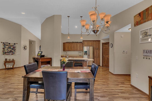 662 Cottonwood Ave, Litchfield, MN 55355 - dining space with light wood-type flooring, a chandelier, and recessed lighting