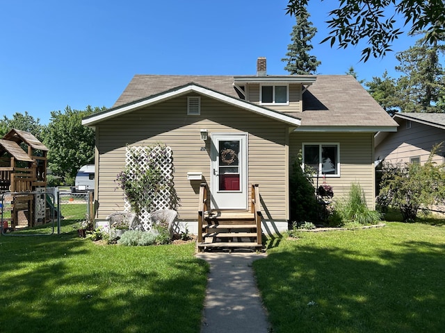 20 King Ave SW, Wadena, MN 56482 - bungalow-style house featuring entry steps and a chimney