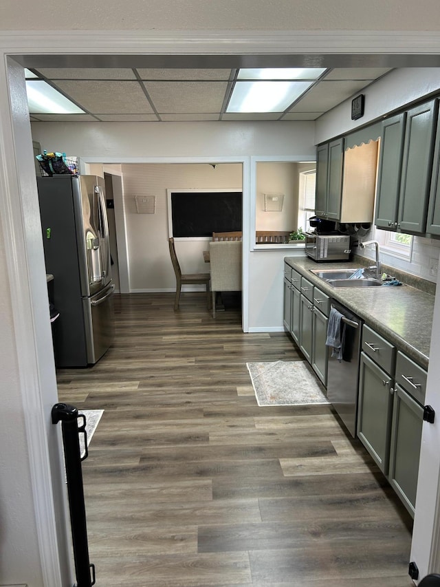 20 King Ave SW, Wadena, MN 56482 - kitchen featuring appliances with stainless steel finishes, dark wood-type flooring, and dark countertops