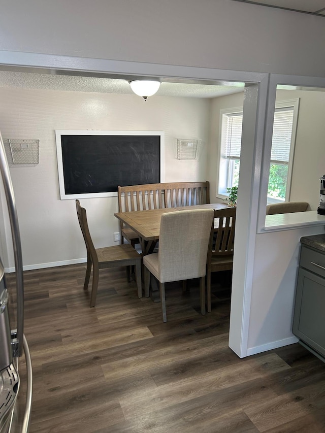 20 King Ave SW, Wadena, MN 56482 - dining space with dark wood-type flooring and baseboards