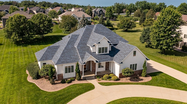 1608 Greystone Ln SW, Rochester, MN 55902 - view of front of property featuring roof with shingles, brick siding, a porch, and stucco siding