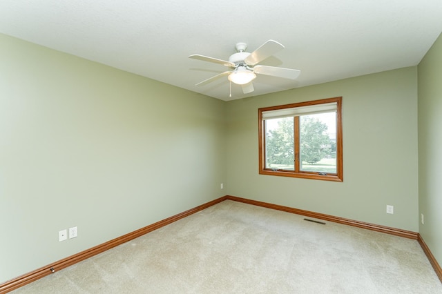1608 Greystone Ln SW, Rochester, MN 55902 - unfurnished room featuring carpet flooring and a ceiling fan