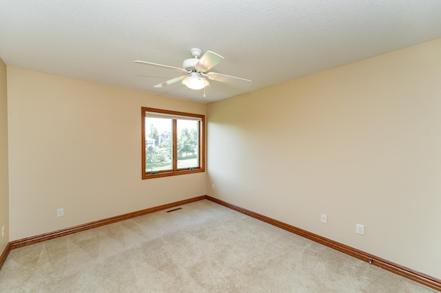 1608 Greystone Ln SW, Rochester, MN 55902 - spare room with light carpet and ceiling fan