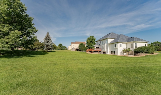 1608 Greystone Ln SW, Rochester, MN 55902 - view of green lawn featuring a wooden deck